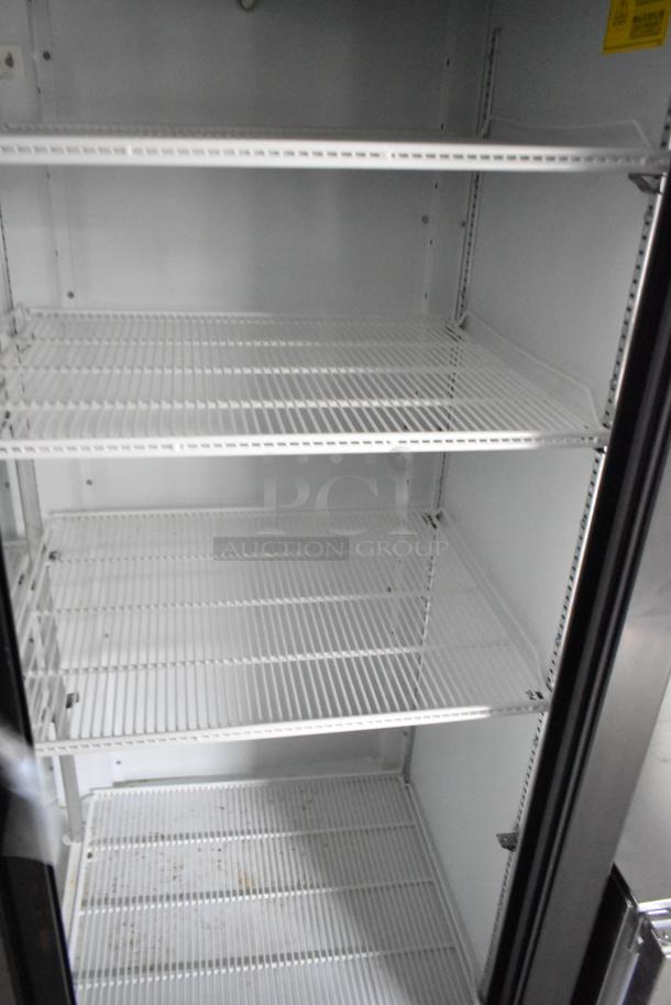 Beverage Air 2-door cooler merchandiser interior, featuring clean wire shelves, part of a Nationwide 24' food trailer setup.