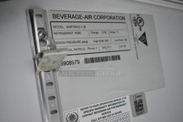 Label on Beverage Air cooler in Nationwide 24' food trailer, model MMF35HC-1-B, refrigerant R290, with warranty info.