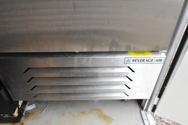 Stainless steel Beverage-Air cooler in Nationwide 24' food trailer, showcasing commercial-grade design for mobile kitchen use.