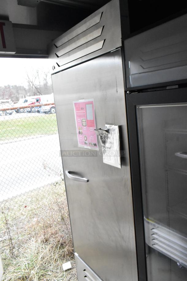 Nationwide 24' food trailer with Beverage Air coolers, Gree AC, commercial appliances. Features signage with menu items.