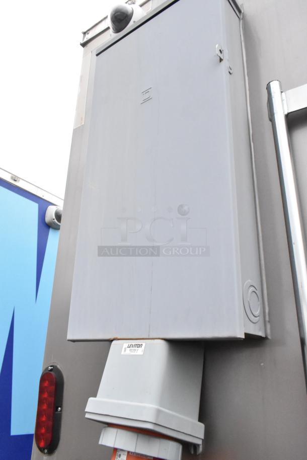 Nationwide 24' food trailer electrical box with Leviton connector; part of fully equipped mobile kitchen setup.