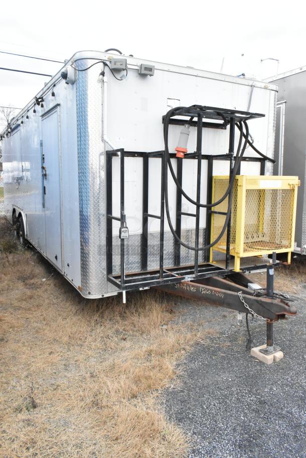 24' Stuff4less mobile kitchen trailer, equipped with Atosa coolers, Royal fryers, and more, ready for operation.