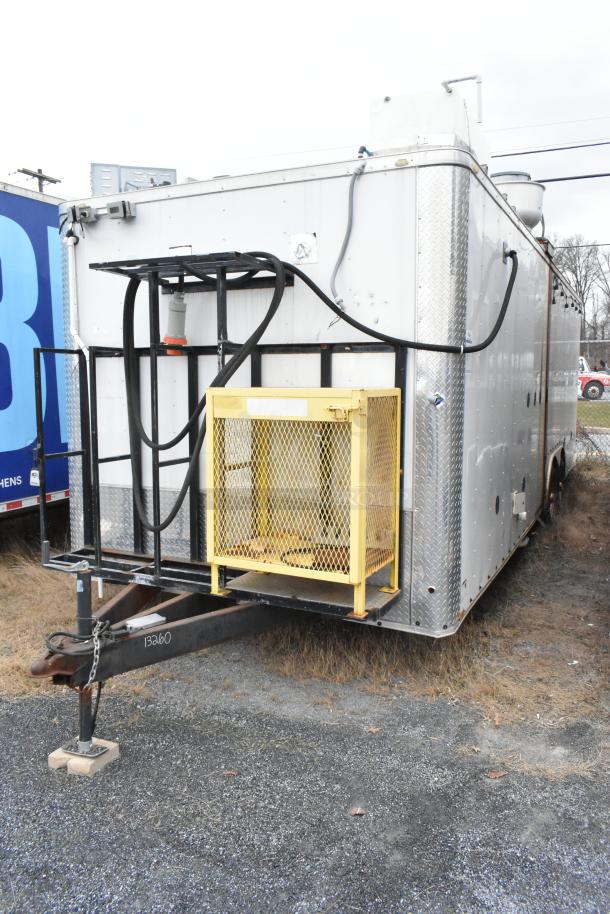 Stuff4less 24' fast food trailer, fully equipped with commercial kitchen appliances, silver exterior, ready for use.
