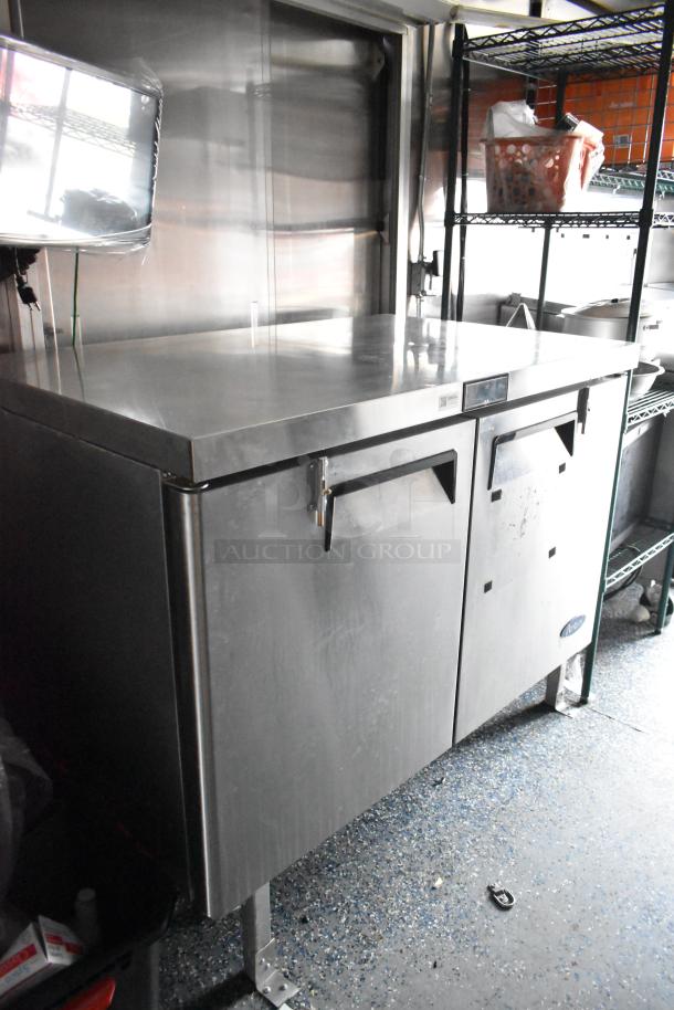 Stuff4less mobile kitchen interior featuring Atosa pizza prep table, stainless steel finish, commercial-grade equipment.