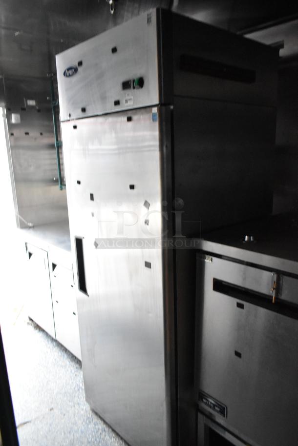 Stuff4less 24' fast food trailer interior with Atosa reach-in cooler, stainless steel appliances, and ample workspace.