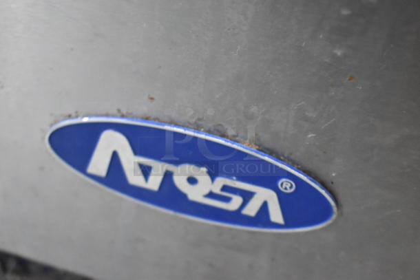 Close-up of Atosa brand logo on a commercial-grade appliance surface, part of a Stuff4less 24' mobile kitchen trailer.