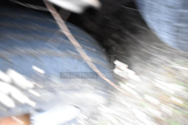 Blurry image; details of the Stuff4less 24' corporate spec fast food trailer not visible.