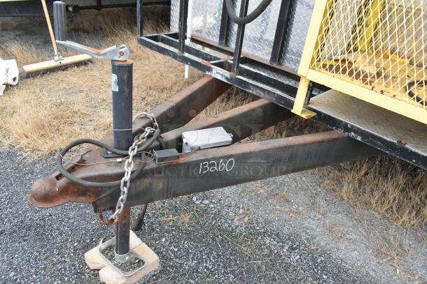 Stuff4less 24' fast food trailer hitch detail, showing metal frame, chains, and handwritten number 13260.