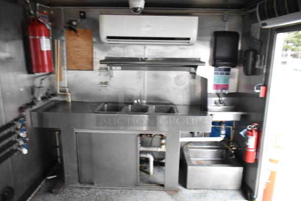 Brand new 2019 Stuff4less 24' food trailer interior. Features stainless sinks, air conditioner, fire extinguisher, ready for equipment.