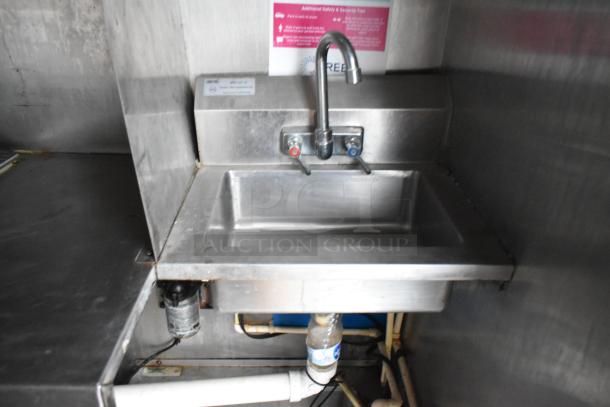 Stainless steel sink inside Stuff4less 24' mobile kitchen trailer, equipped and ready for customization.