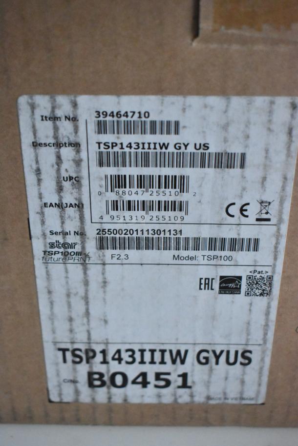 Alt text: Shipping label for a Star Micronics printer model TSP100, item no. 39464710, with barcodes and CE marking.