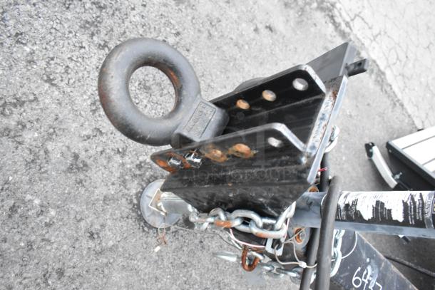 SDG 20' unbranded shell food trailer hitch detail; new condition, unoutfitted, includes hand and mop sinks, clear title.