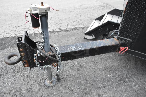 SDG 20' unbranded food trailer hitch and chains, ready for kitchen outfitting, sold with clear title.