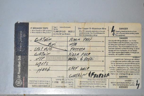 GE PowerMark Gold breaker label with handwritten appliance details for food trailer, including A/C, freezer, and chef base.
