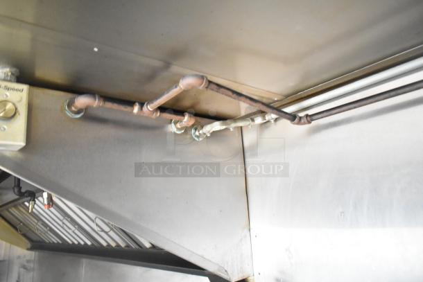 Interior view of Stuff4less 24' food trailer, showing ventilation and piping. New condition, ready for equipment installation.