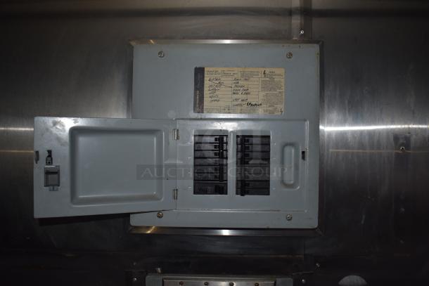 Electrical panel inside a 2019 Stuff4less 24' unbranded shell food trailer. Features labeled switches and wiring diagram.