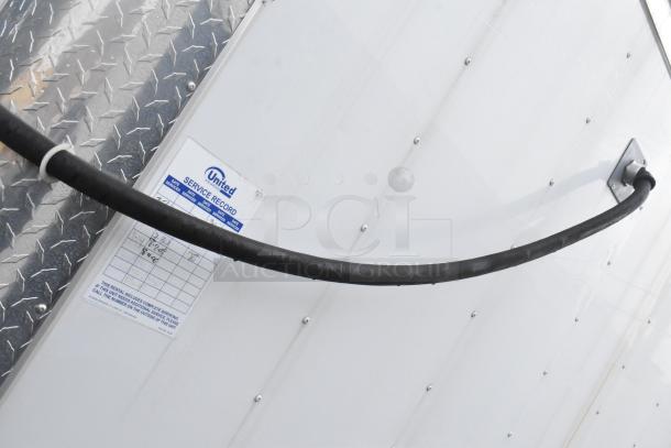 Stuff4less 24' fast food trailer with service record label, indicating maintenance history. Features commercial equipment.