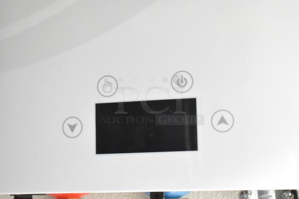 Control panel of a Nationwide 24’ cold food and beverage retail trailer, featuring touchscreen and control buttons.