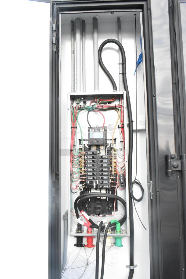 Electrical panel inside a new 2020 SDG 20' mobile kitchen trailer, showing wiring and circuit breakers.