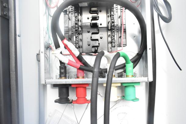 Interior view of SDG 20' food trailer showing cables and wiring ready for equipment installation. New condition.