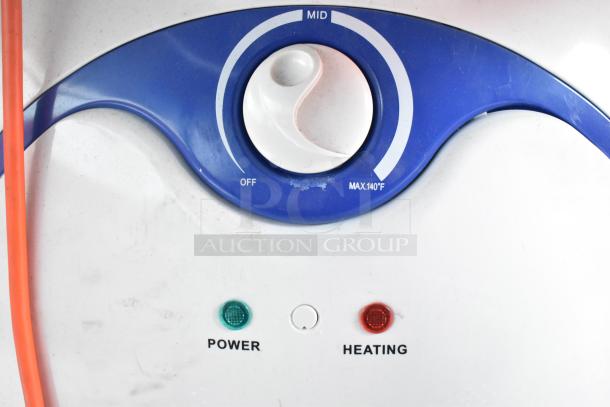 Dial showing temperature settings and indicators for power and heating on a piece of equipment.