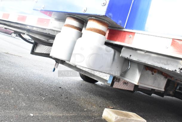 Undercarriage of 2021 Rock Solid Cargo 24' mobile kitchen trailer, featuring new equipment setup and clear title.