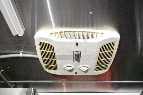 Ventilation system in a Rock Solid Cargo mobile kitchen trailer, featuring adjustable controls.