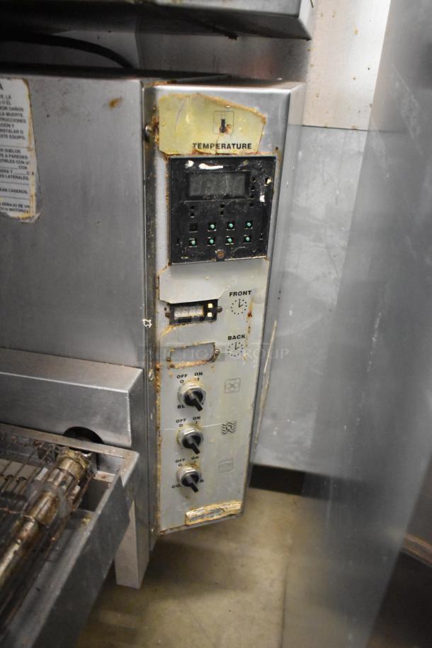 Middleby Marshall PS540G stainless steel pizza oven control panel; visible wear, includes temperature control and settings dials.