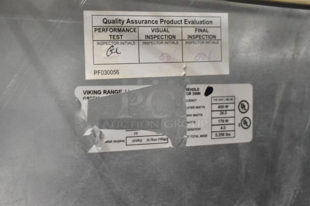 Viking stainless steel 2-door cooler and freezer, 115V, 1 phase. Quality assurance label and specifications visible. Brand new scratch and dent.