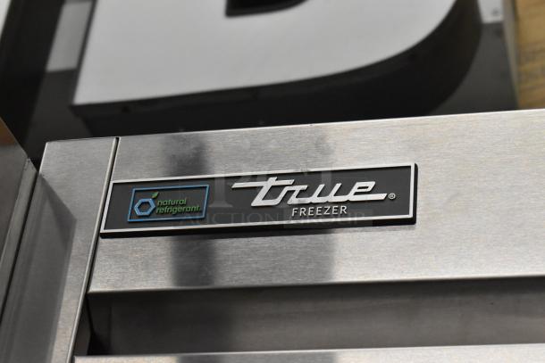 2021 True T-23F-HC Freezer, stainless steel, single door, poly-coated racks, commercial casters, 115 volts, 1 phase.