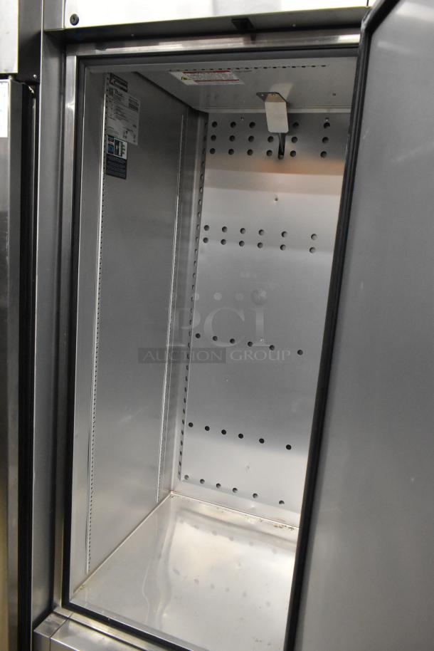 2021 True T-23F-HC stainless steel reach-in freezer, single door, poly-coated racks, commercial casters, 115V, 1 Phase.