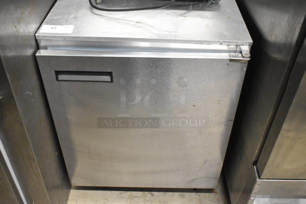 Delfield 406CA stainless steel single door undercounter cooler; 115V, 1 phase; missing one caster; commercial use.