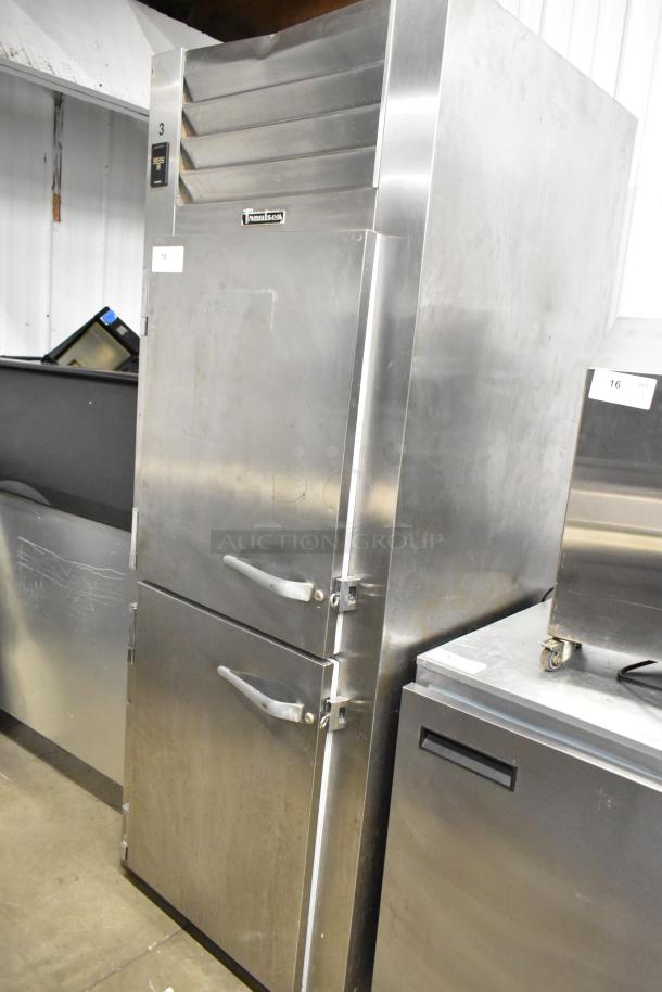 Traulsen RHT132W-HHS stainless steel reach-in cooler, 2 half-size doors, 115V, 1 phase, used, some exterior wear.