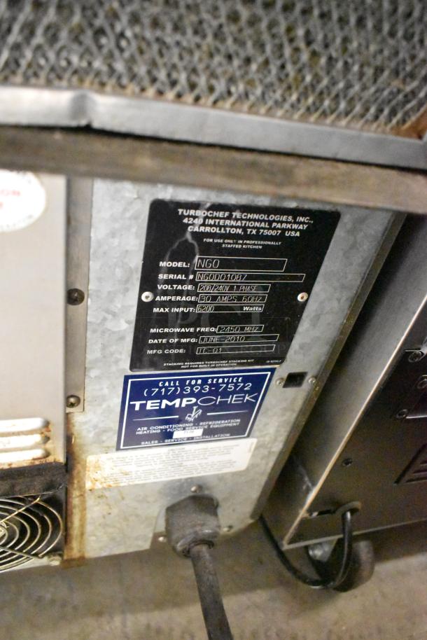 Turbochef NGO metal commercial rapid cook oven, electric, 208/240V, 1 Phase. Visible label with model and voltage details.