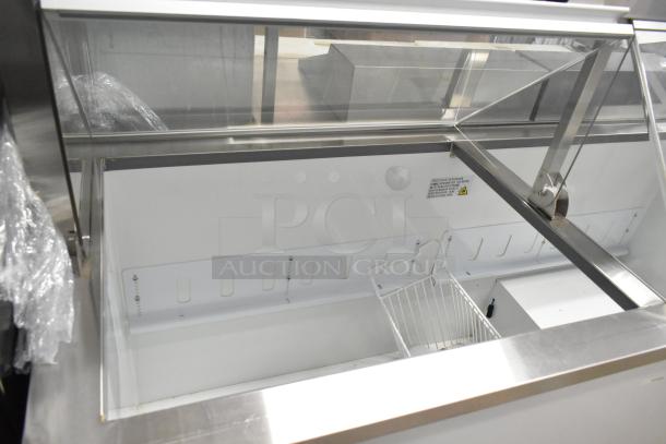 2023 Avantco DPC-66-HC commercial ice cream dipping cabinet, metal, 115 volts, 1 phase, pristine condition, open lid.