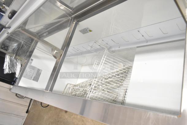 2023 Avantco DPC-66-HC metal commercial ice cream dipping cabinet, 115 volts, new condition, interior view with shelves.