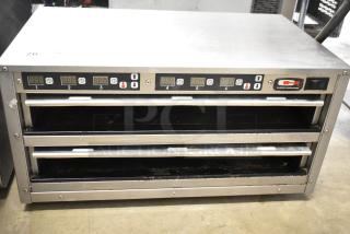 Carter Hoffmann MC212S2-2DD stainless steel heated holding cabinet with digital controls, six slots, lightly used condition.