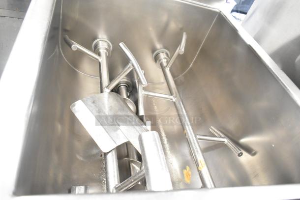 Biro EMG-32 stainless steel meat mixer grinder, commercial floor style, visible grinding components, on casters, 208V, 3-phase.