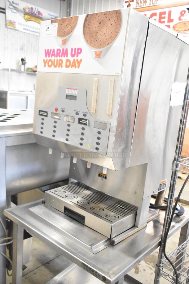 Bunn IMIX-5 commercial cappuccino machine on stainless steel stand. Features control panel, "Warm Up Your Day" graphic, 120/208-240V, 1 phase.