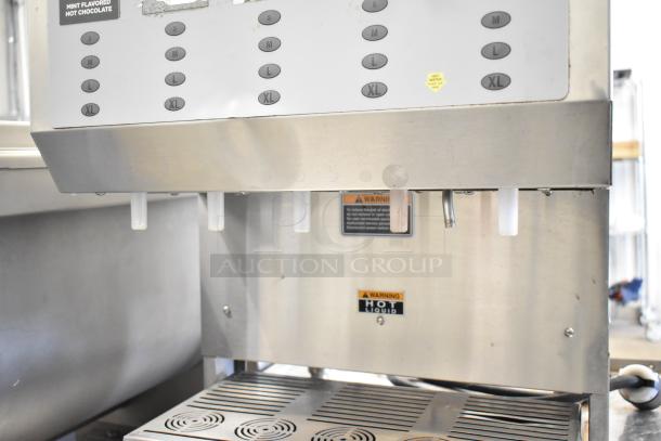 Bunn IMIX-5 stainless steel cappuccino machine on stand, features dispensing controls, 120/208-240V, 1 phase. Warning labels visible.