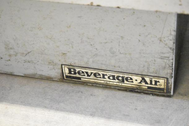 Beverage Air GF48L stainless steel commercial back bar bottle cooler with 2 sliding lids, 115 volts, 1 phase. Visible brand label.