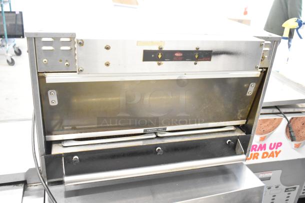Hatco stainless steel heated holding cabinet, countertop model, 120 volts, 1 phase. Visible "Caution: Hot" label, used condition.
