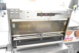 Hatco stainless steel heated holding cabinet, countertop model, 120 volts, 1 phase. Visible "Caution: Hot" label, used condition.
