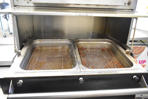 Hatco stainless steel heated holding cabinet merchandiser, 120V, 1 phase, with dual trays, used condition.