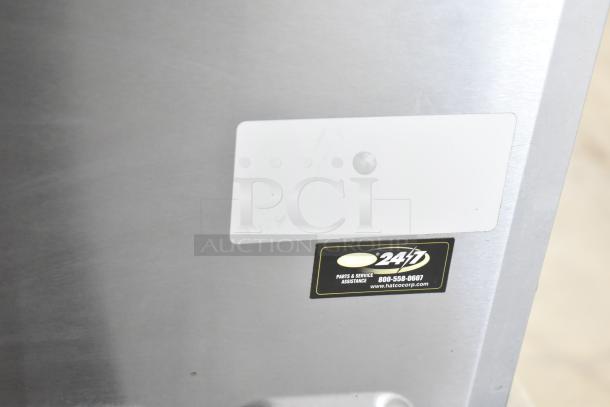 Hatco Stainless Steel Heated Holding Cabinet, 120V, 1 Phase, tag with Hatco service details visible.