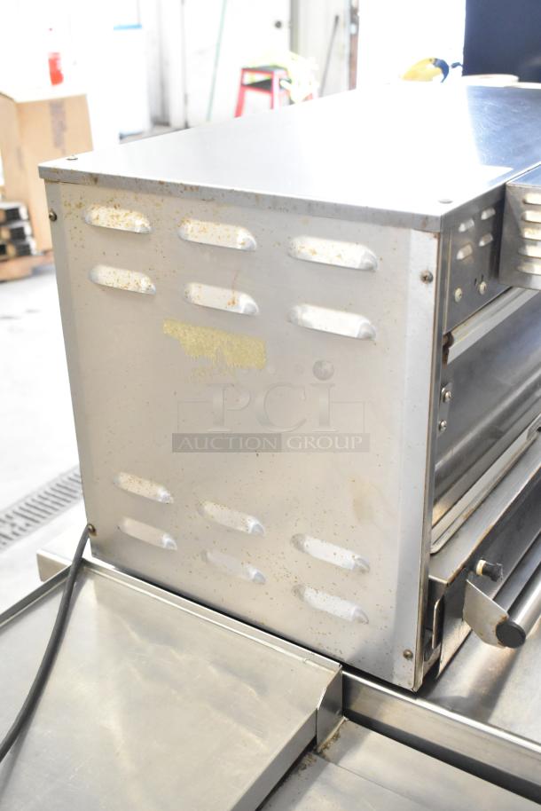 Hatco stainless steel heated holding cabinet, commercial countertop model, 120 volts, visible wear, electrical cord attached.