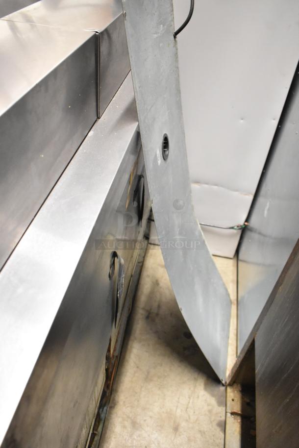 Delfield 4448N-12 stainless steel prep table with mega top, features Bain Marie design, commercial casters, 115V, 1 phase.