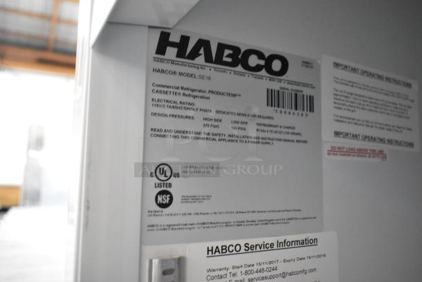 2019 Habco SE18 metal commercial reach-in cooler with poly-coated racks. Model and electrical details label visible.