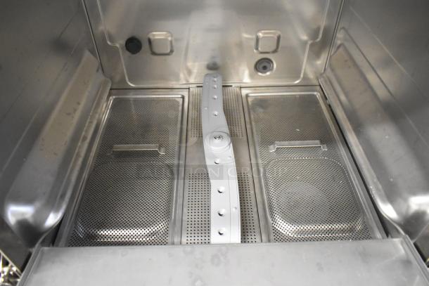 Brand new Hobart Centerline CUH stainless steel commercial undercounter dishwasher interior, 208/240 volts, 1 phase.