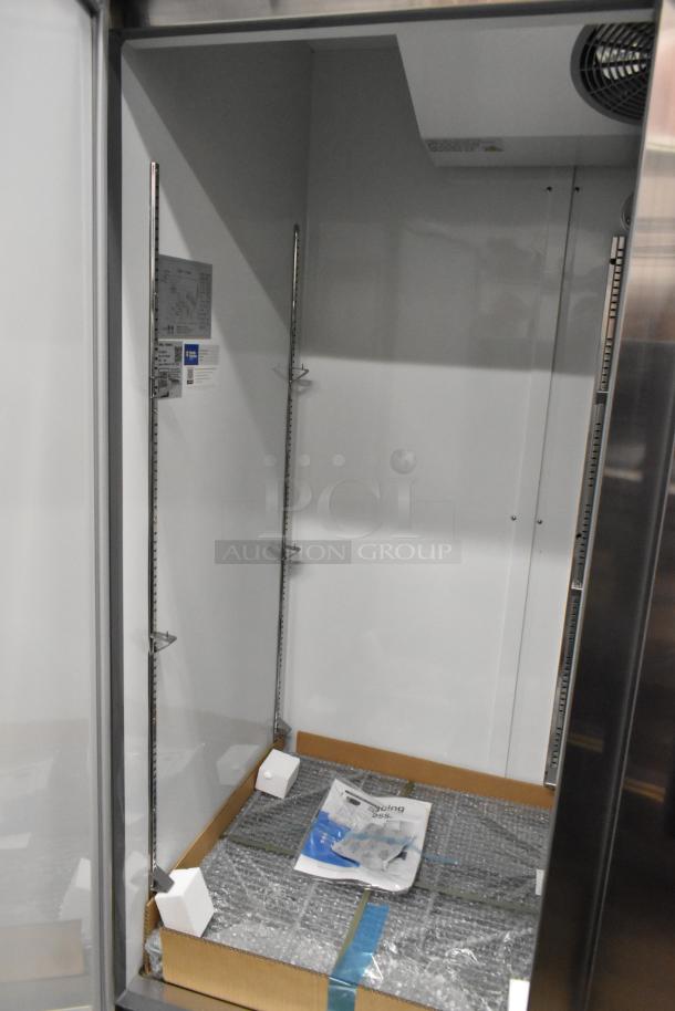 Brand new Avantco 178A49FHC stainless steel commercial freezer, scratch and dent, with poly coated racks, 115V, 1 phase.